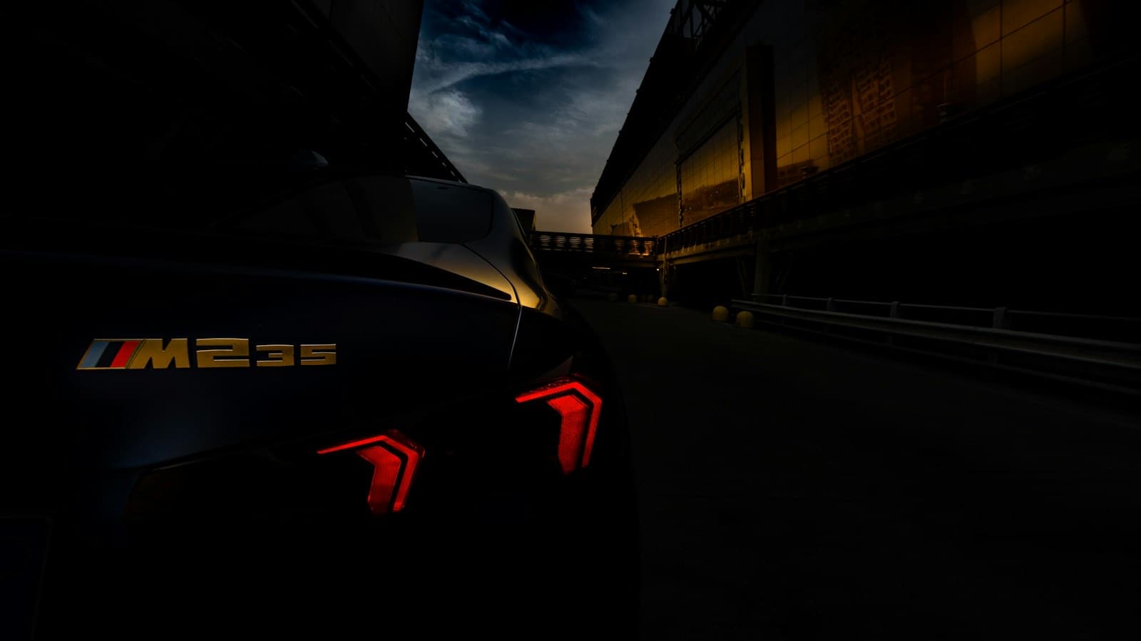 A car's red taillights glowing at night
